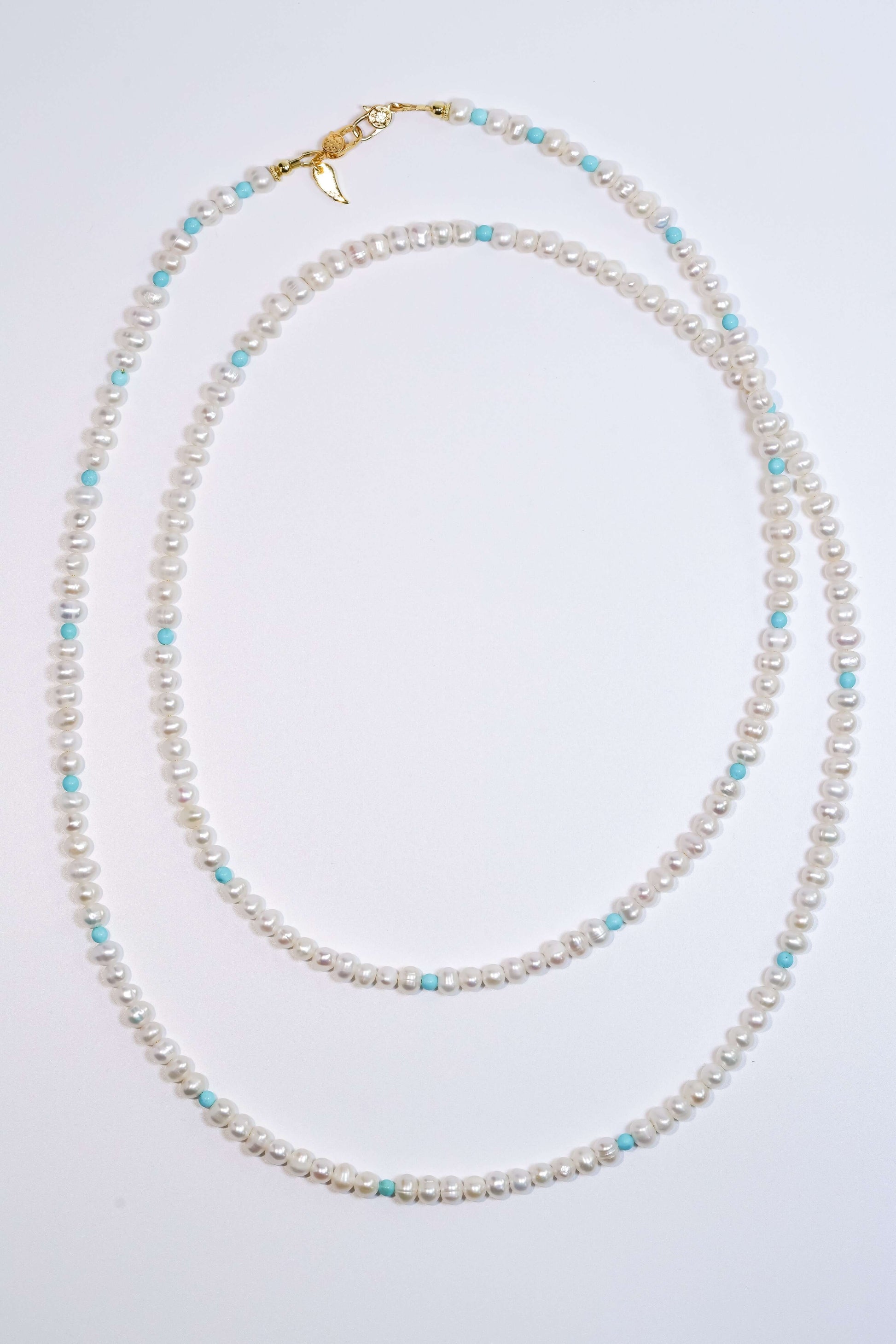 Elegant pearl-turquoise cross-body phone strap with S925 silver plated 18K gold hardware, 120cm length.