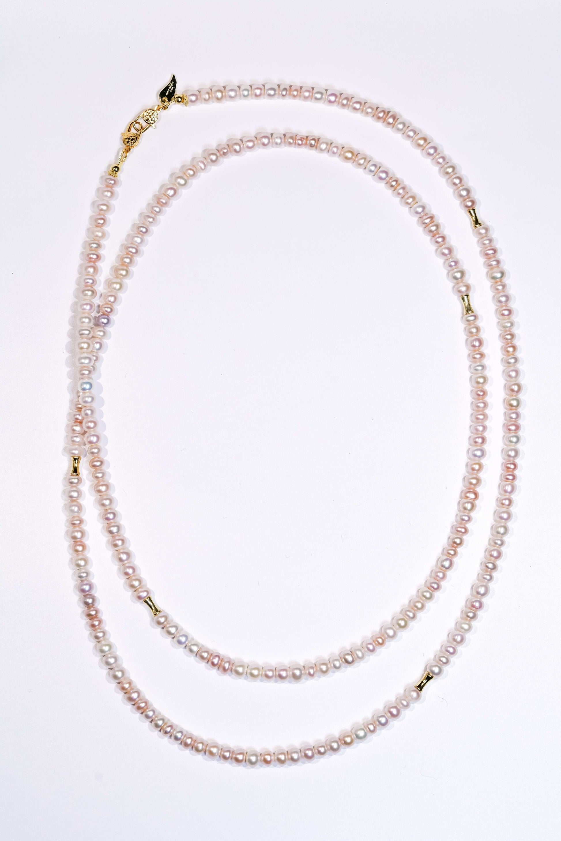 Candy pearl cross-body phone strap with 925 silver accents, versatile for phone or necklace wear.