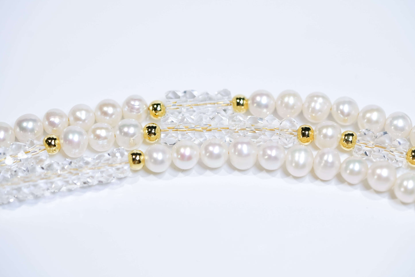 Elegant Pearl-White Crystal Cross-body Phone Strap with gold accents, crafted for style and versatility.