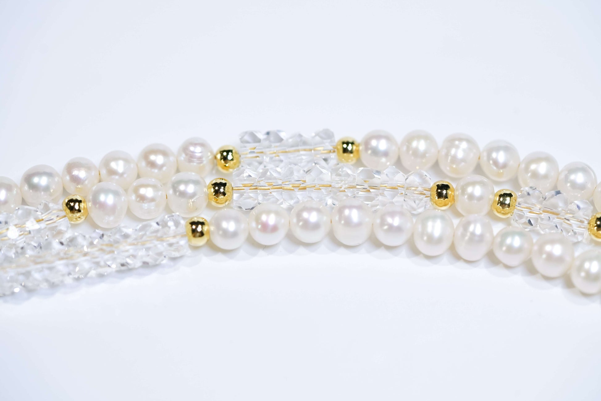 Elegant Pearl-White Crystal Cross-body Phone Strap with gold accents, crafted for style and versatility.