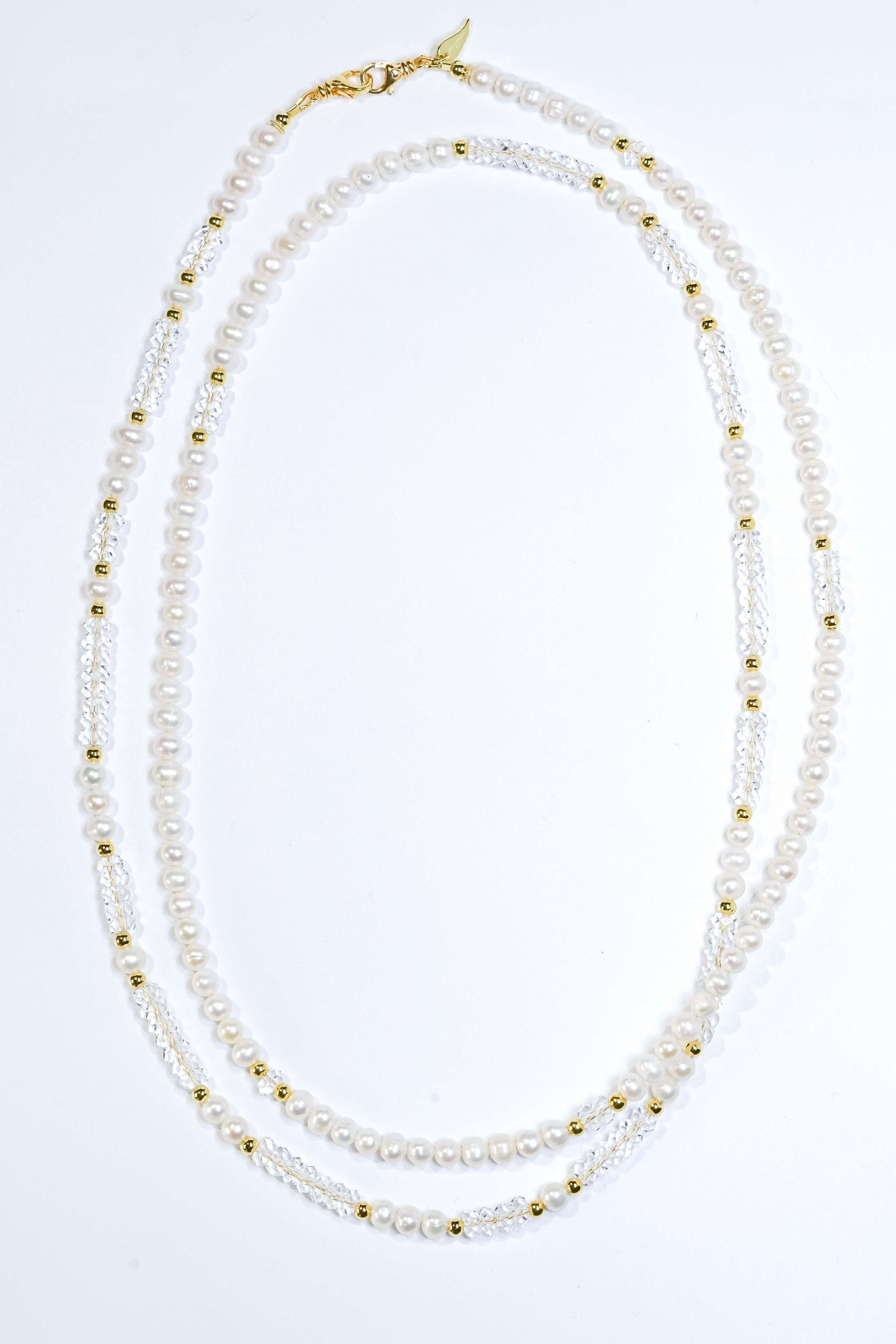 Pearl-White Crystal Cross-body Phone Strap/ Necklace with natural pearls and golden accents, versatile two-way accessory.