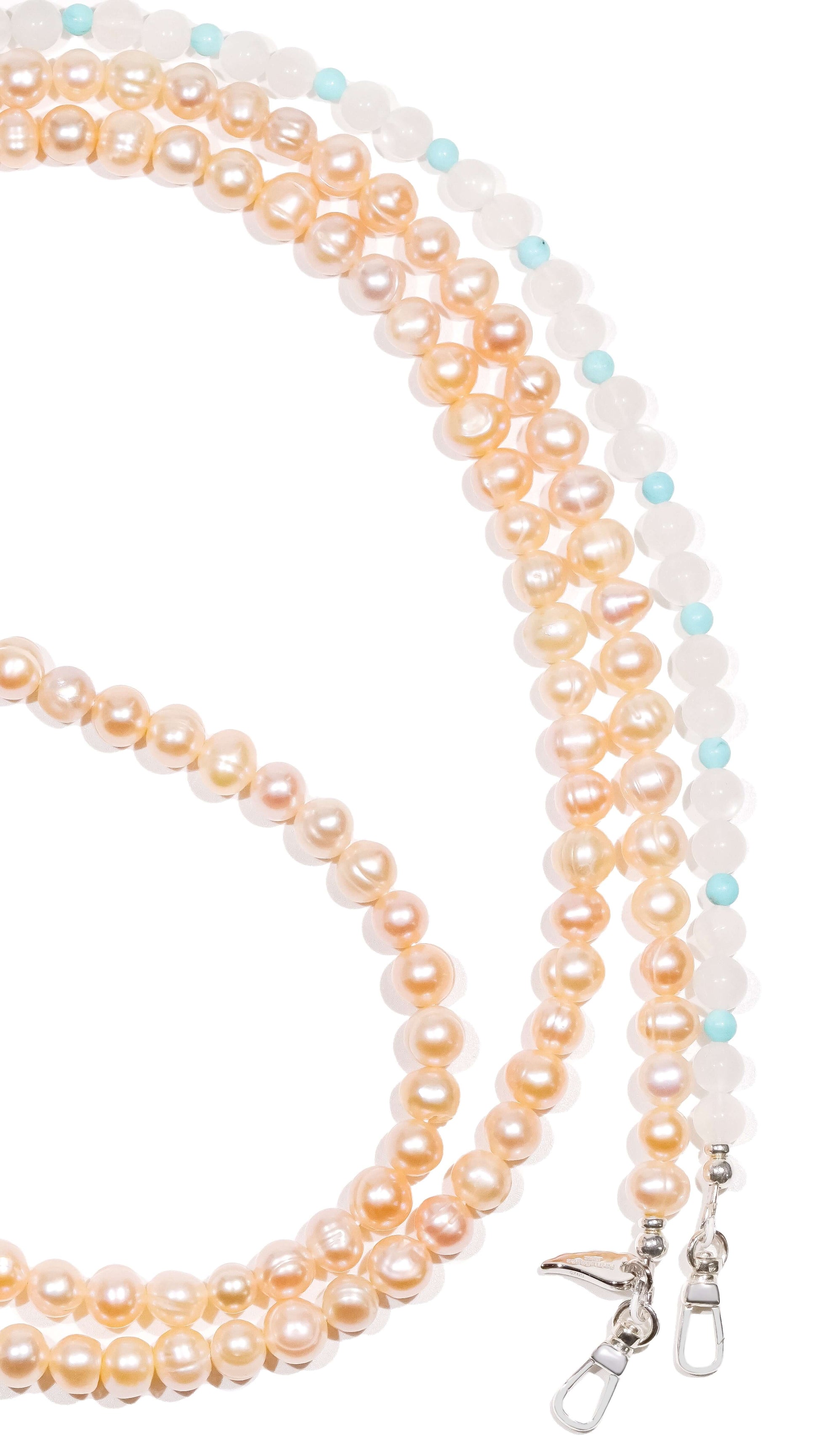 Blush pink pearl, moonstone, and turquoise cross-body phone strap with S925 silver hardware. Elegant and feminine design.