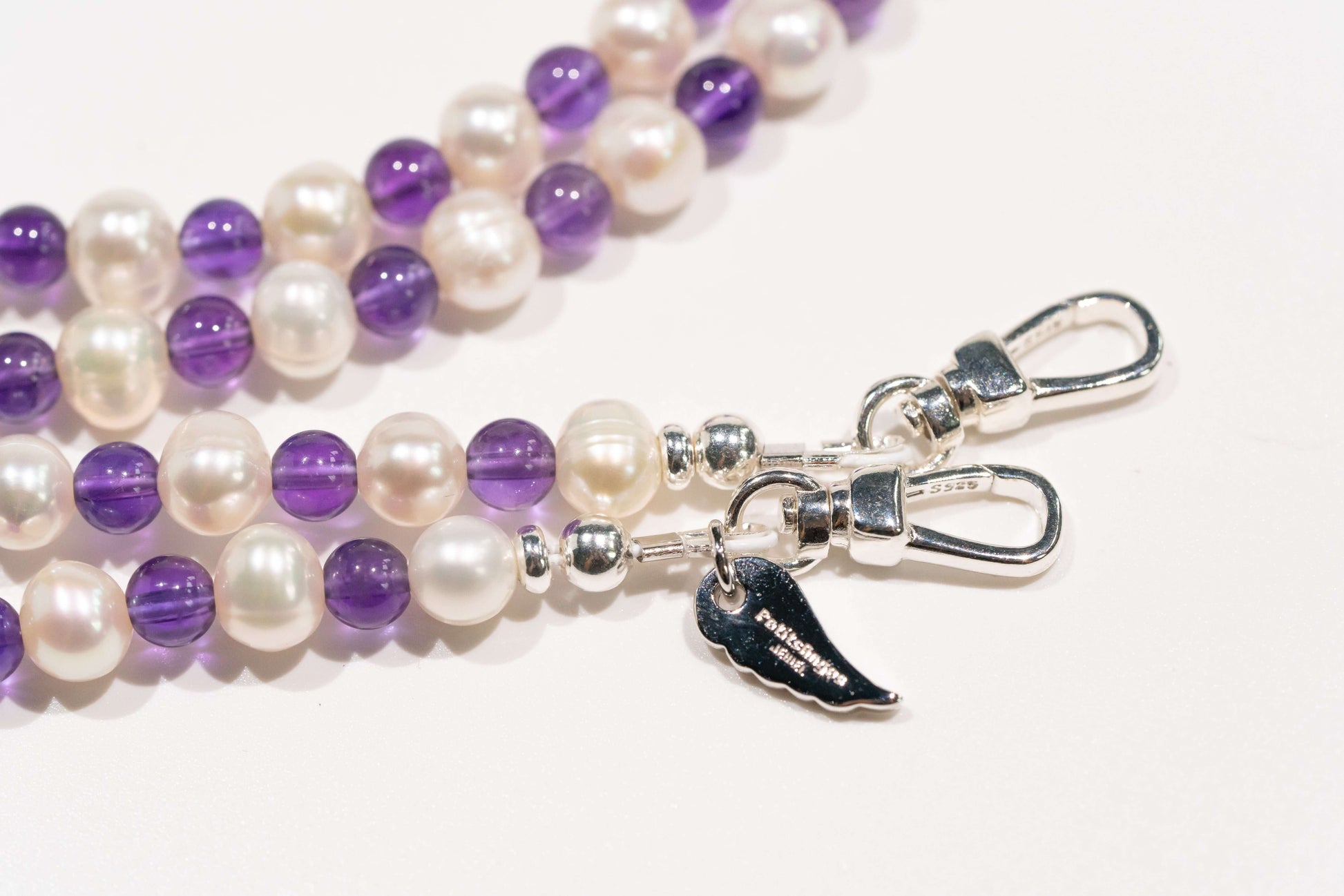 Pearl and amethyst cross-body phone strap with S925 silver hardware, featuring natural pearls and amethyst stones.