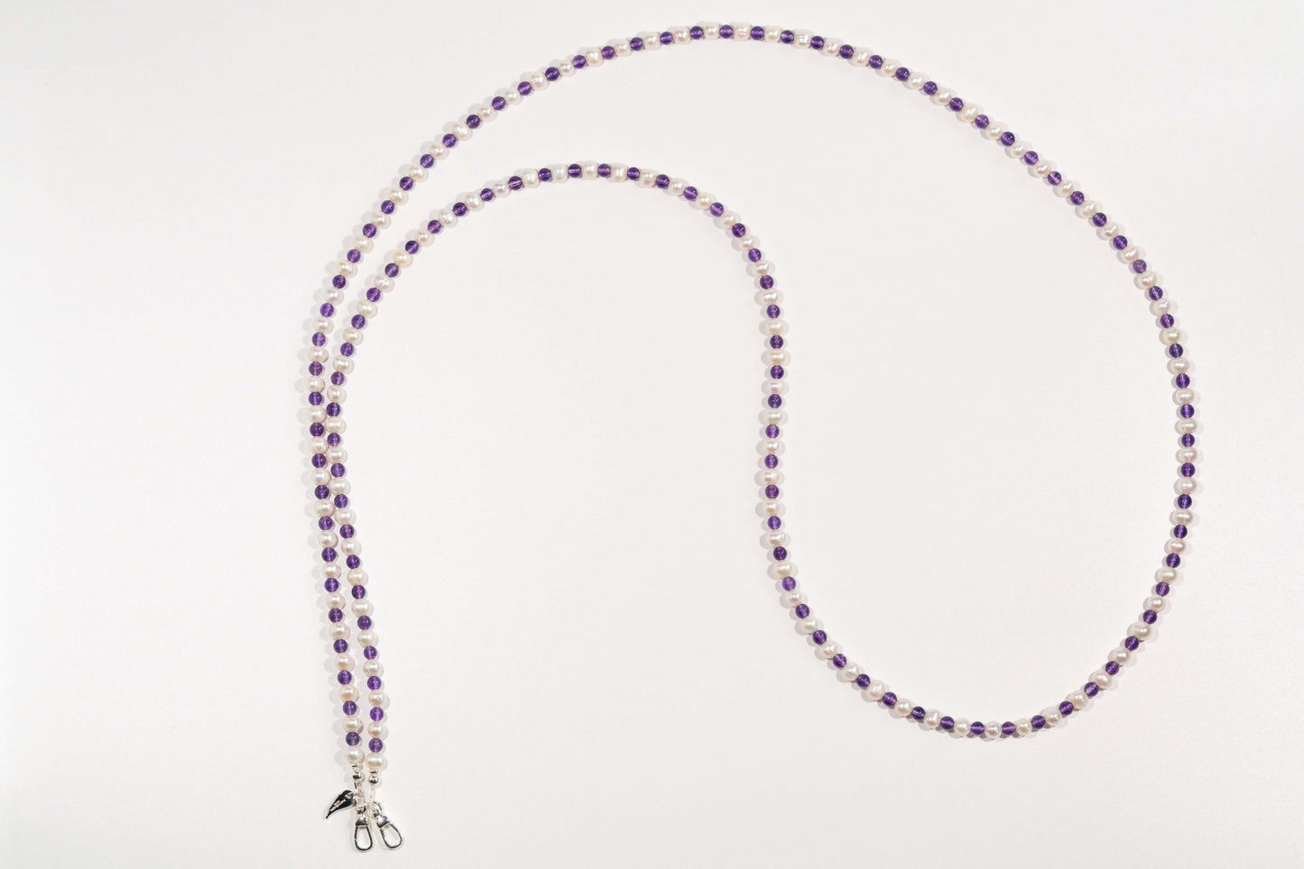 Pearl-Amethyst cross-body phone strap with natural pearls, amethyst stones, and S925 silver hardware, 120cm long.