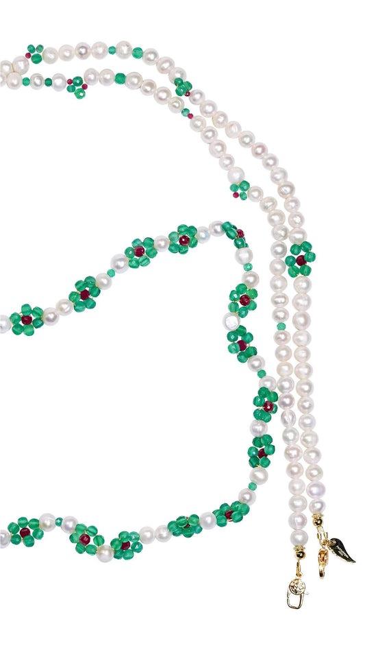 Pearl-green agate and ruby cross-body phone strap/necklace with floral design. Elegant and artistic handheld accessory.