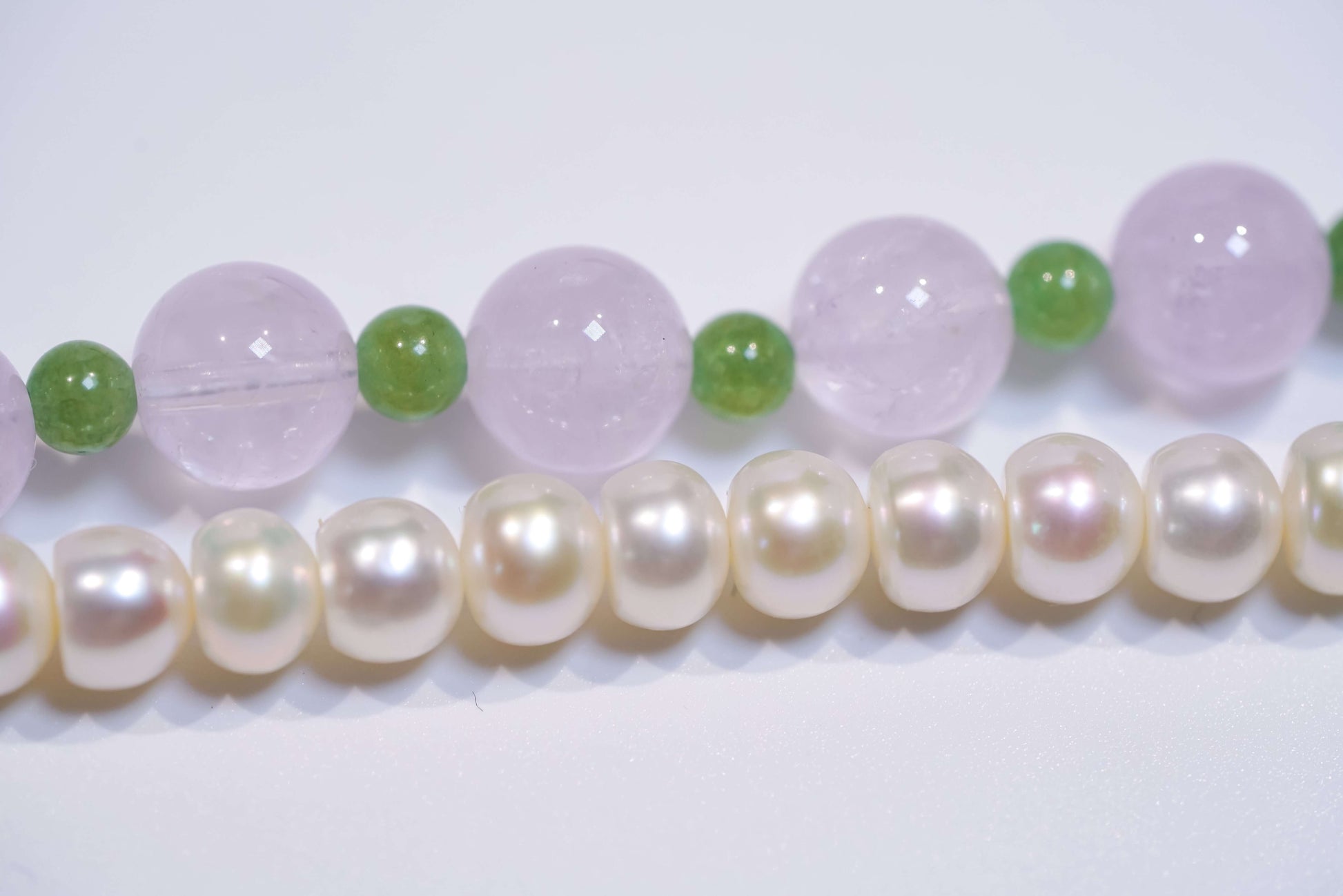 Pearl-lavender amethyst and nephrite jade beads for two-way phone charm bracelet, showcasing calmness and natural beauty.